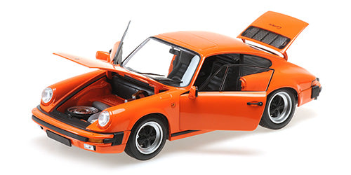 MINICHAMPS - PORSCHE 911 CARRERA 3.2 COUPE - 1983 - 1:18 - ORANGE