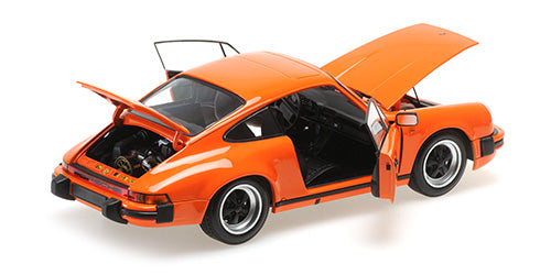 MINICHAMPS - PORSCHE 911 CARRERA 3.2 COUPE - 1983 - 1:18 - ORANGE